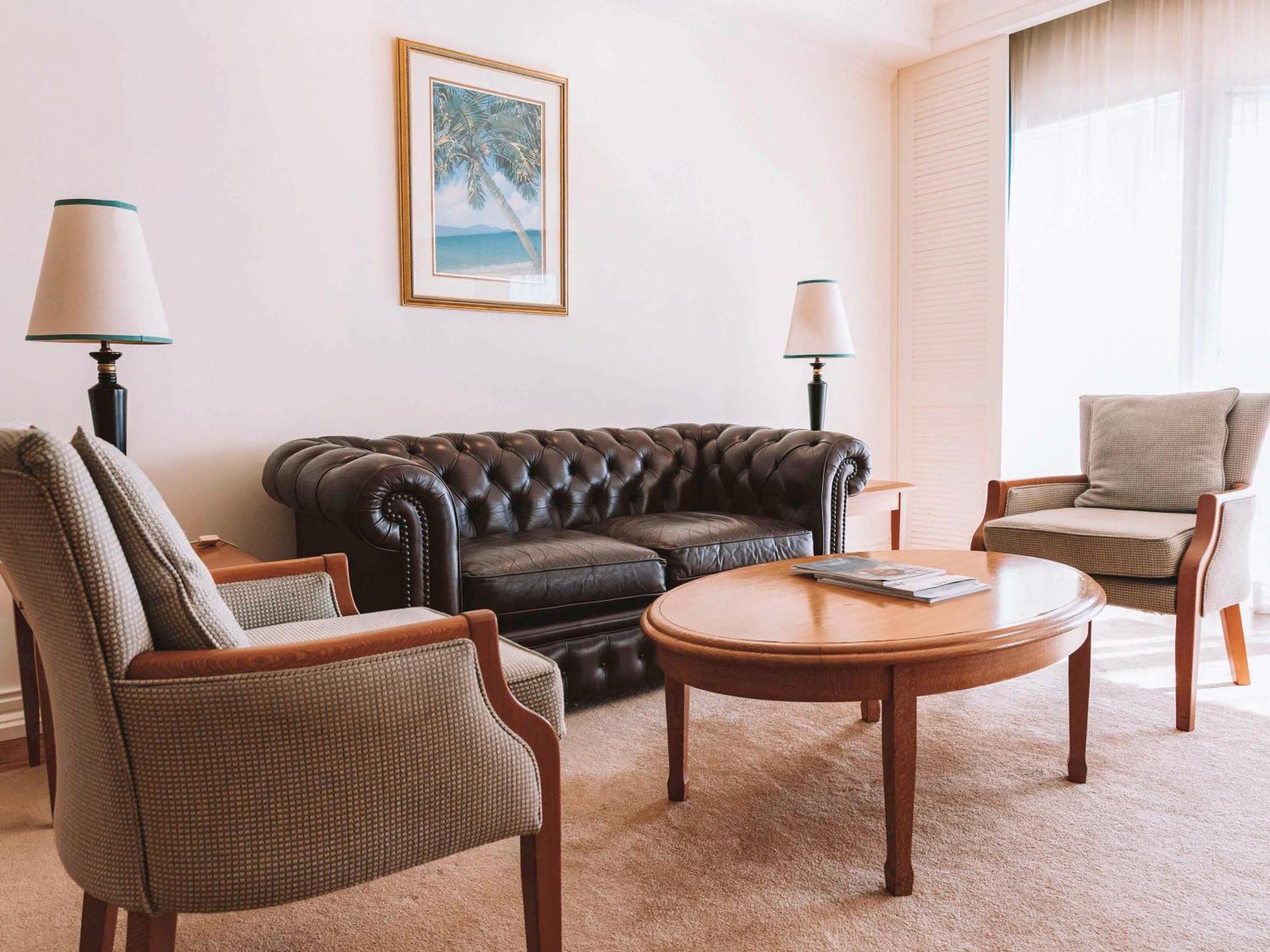 Pullman Cairns International Hotell Exteriör bild A living room