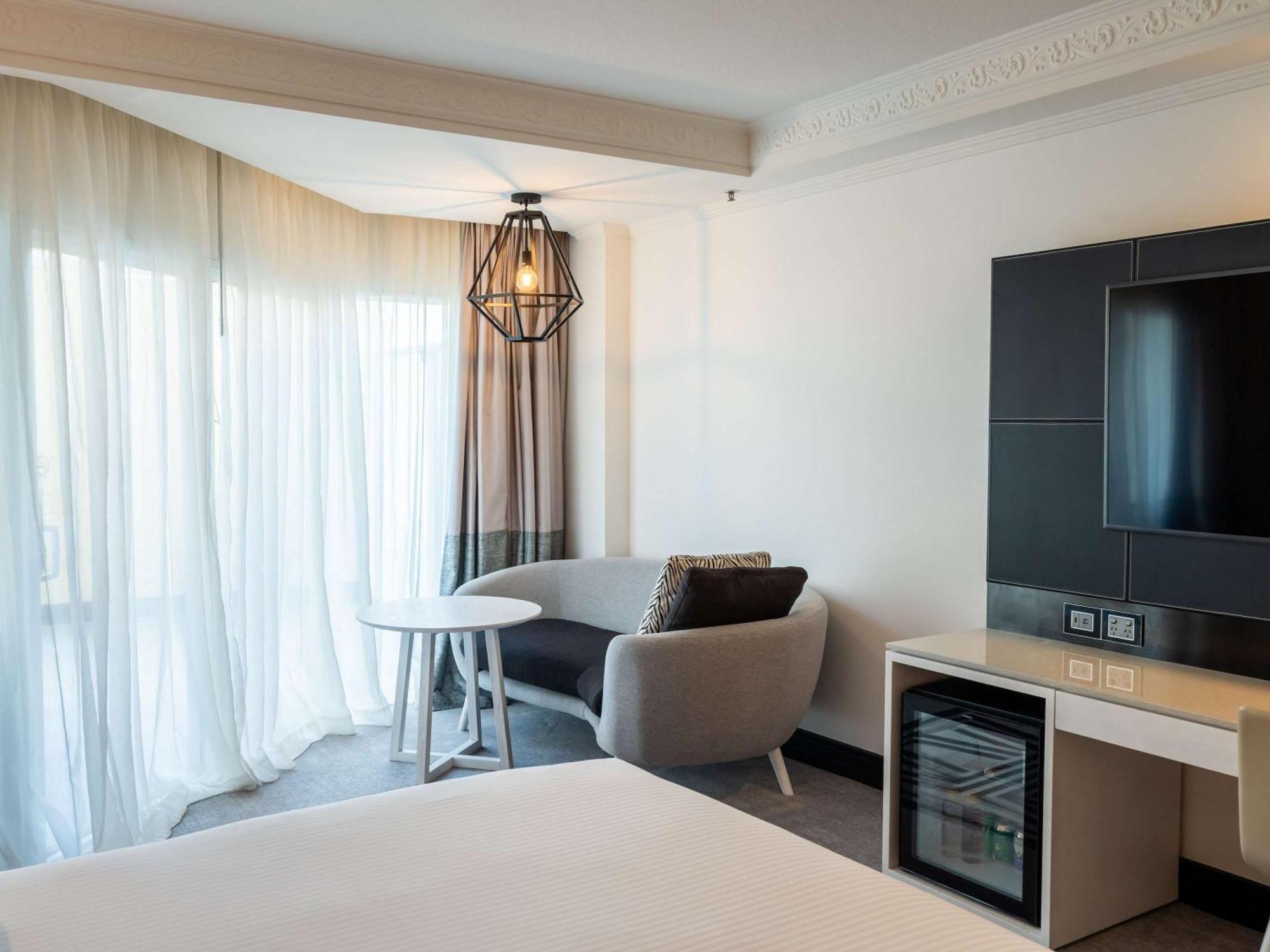 Pullman Cairns International Hotell Exteriör bild A room at the hotel